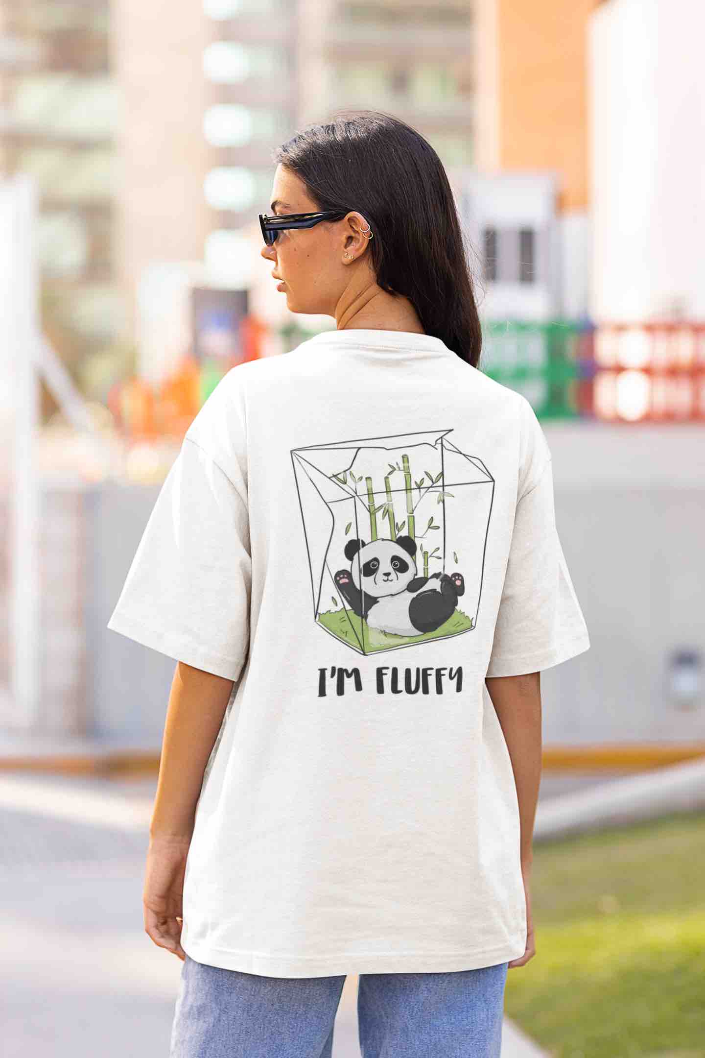 back-view-mockup-of-a-woman-in-an-oversized-t-shirt-on-the-street-m25267 (1) copy itsclover oversized women's tshirt