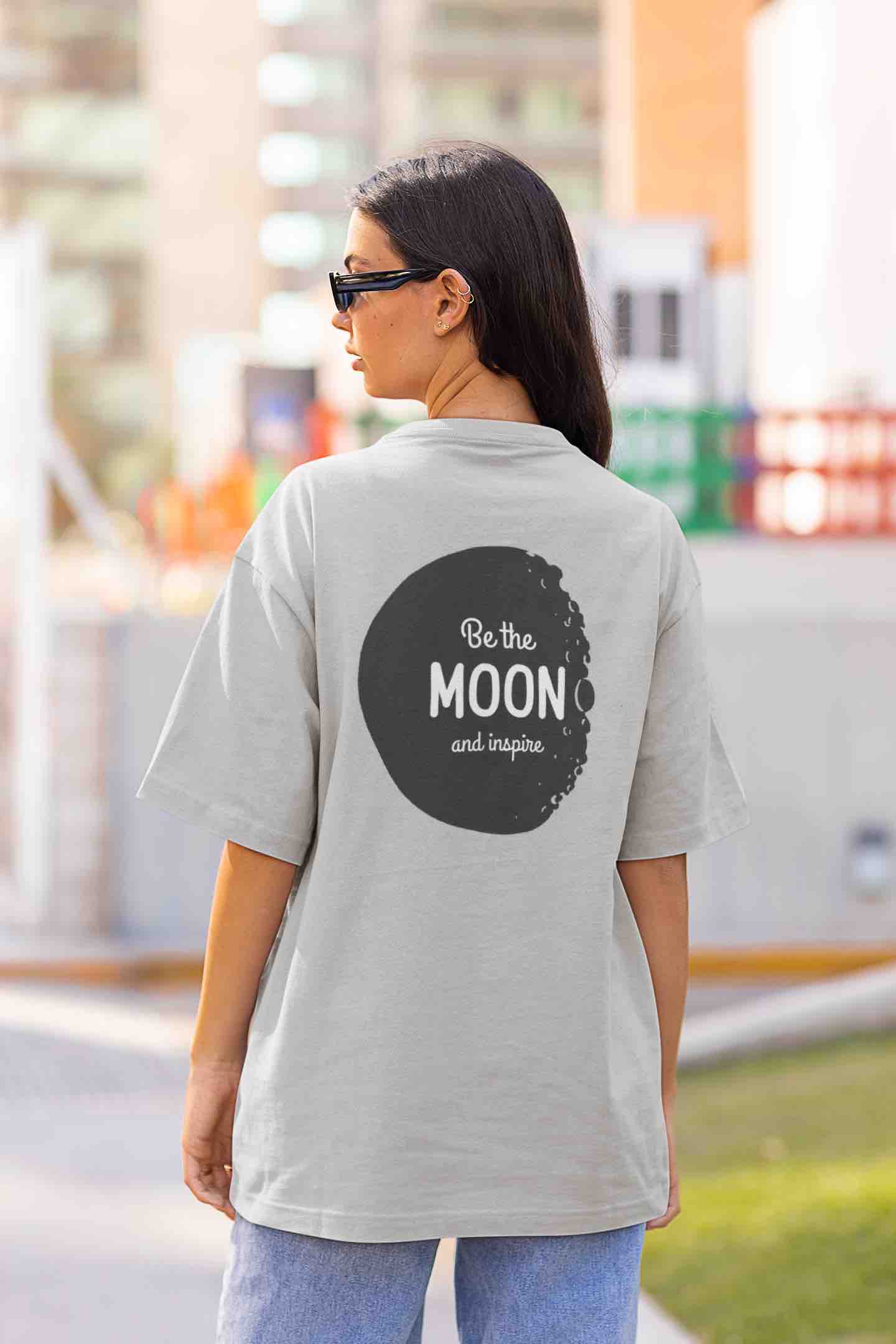 back-view-mockup-qof-a-woman-in-an-oversized-t-shirt-on-the-street-m25267 copy itsclover oversized women's tshirt